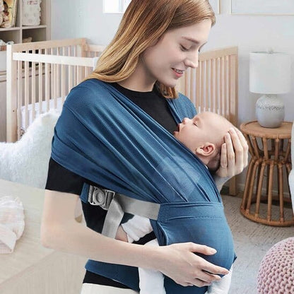 Écharpe de Portage LibertéActive la douceur d'admirer bébé qui dort sereinement contre vous