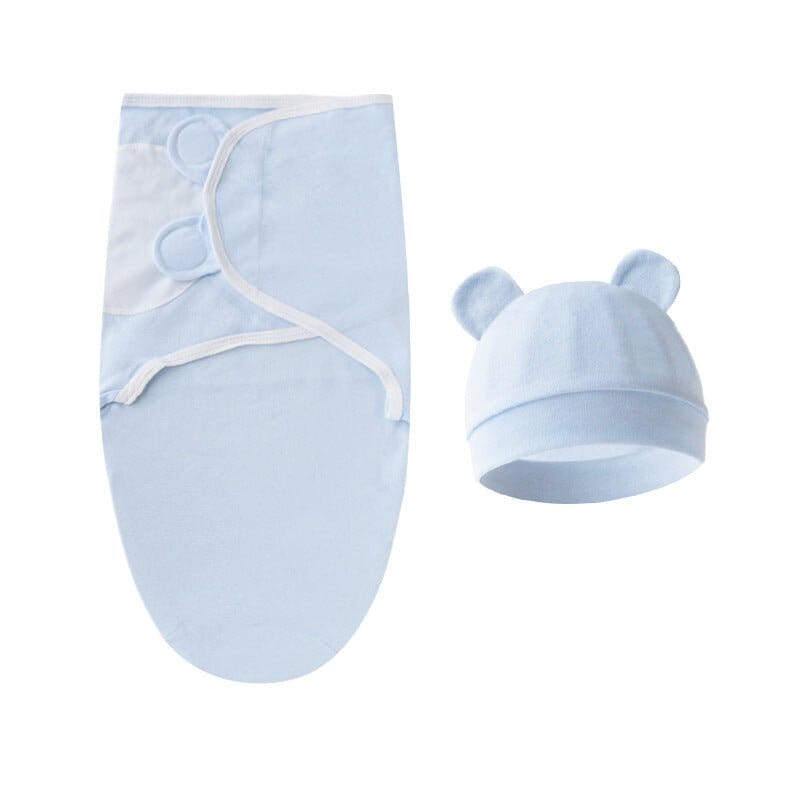 Nid d'Ange Zonath Bleu : une housse cocon avec bonnet pour protéger votre nouveau-né