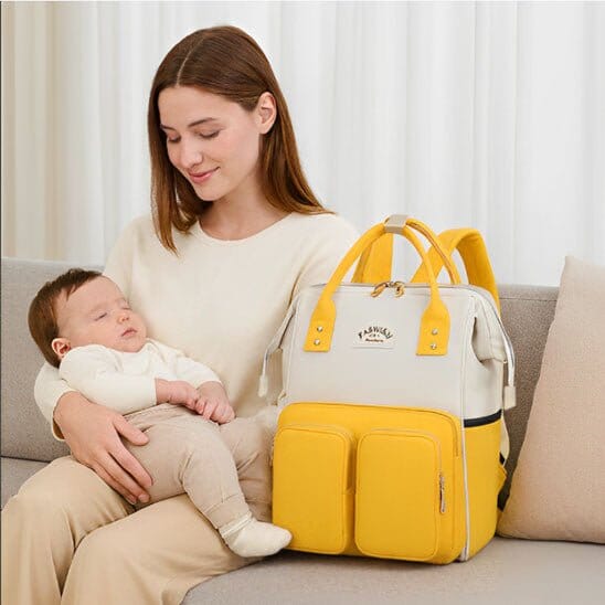 Sac a Langer Bebe NomaChic jaune et blanc ergonomique une petite visite chez des amies