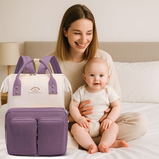 Sac a Langer Bebe NomaChic mauve et blanc spacieux pour une sortie nomade