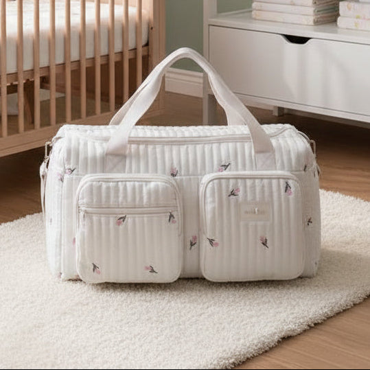 Sac à langer Mavelys un design chic aux tulipes pour une élégance hors pair.